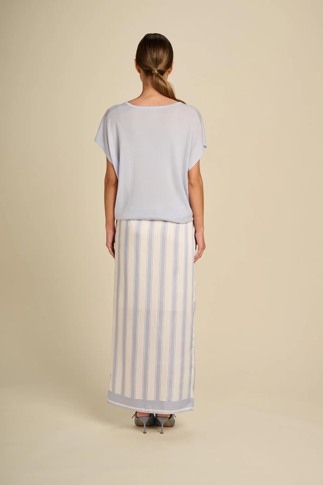 https://images.femalesconceptstore.becosoft.net/articles/Luminous_skirt_sunny_stripes_skyblue_5.webp?qs=4975